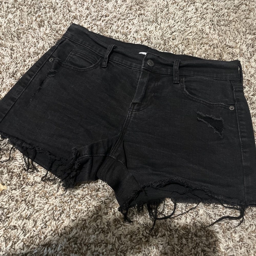 Black denim ripped fringe shorts